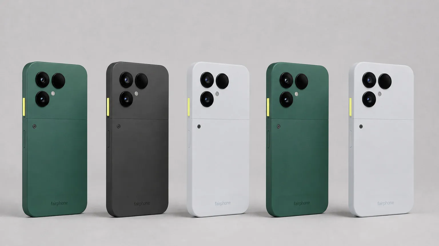 Cinco unidades del Fairphone (Gen. 6) en fila, en verde, negro y blanco, vistas por la parte trasera